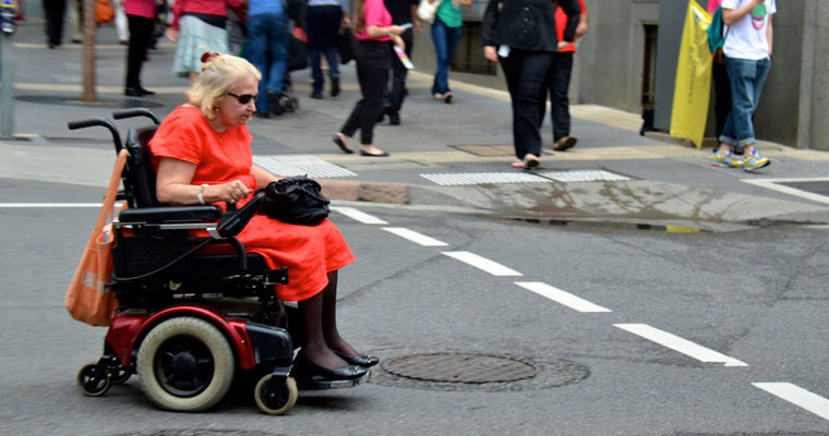 P-in-home-Older-lady-in-motorised-wheelchair